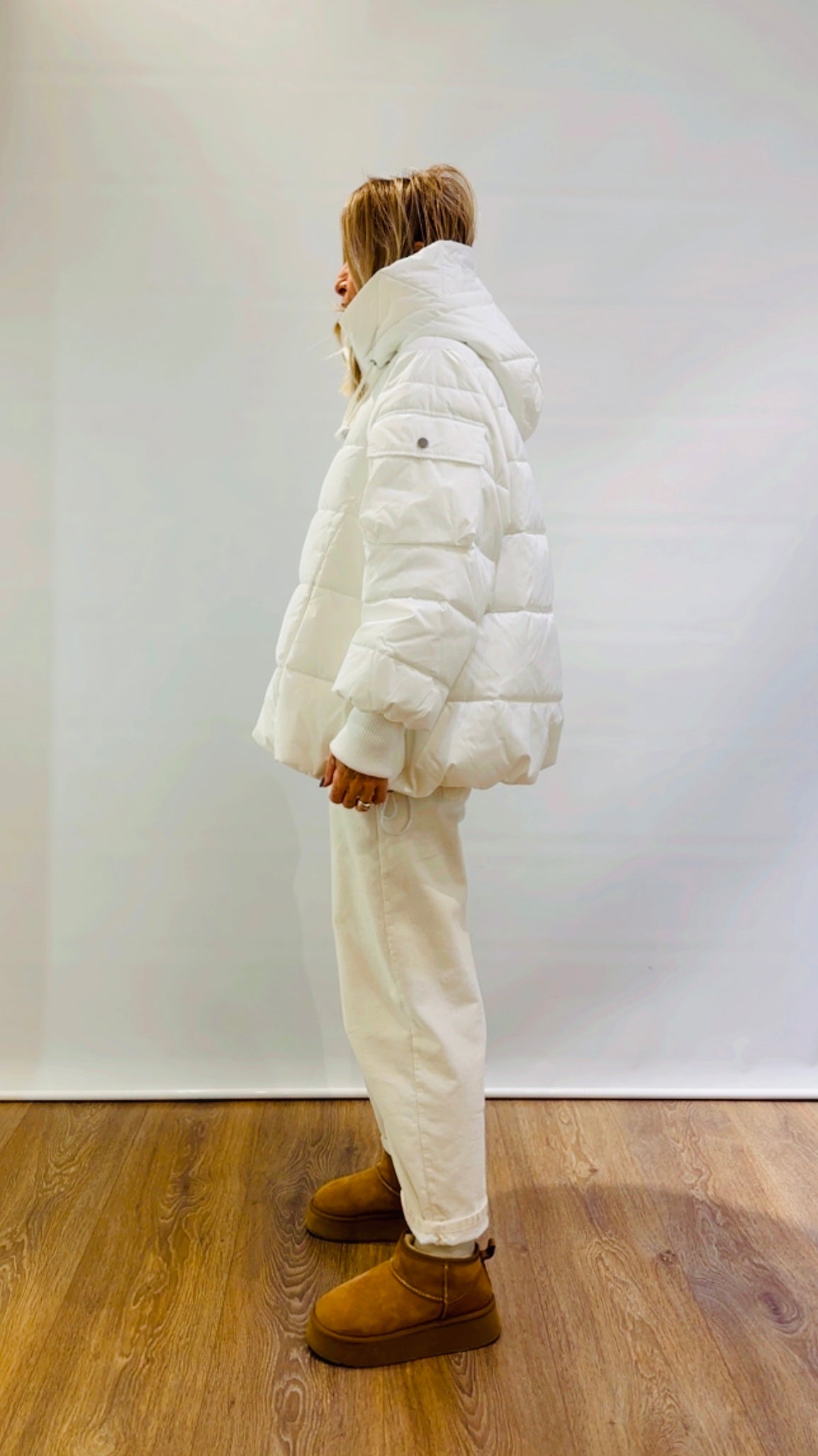 Piumino ad A con cappuccio