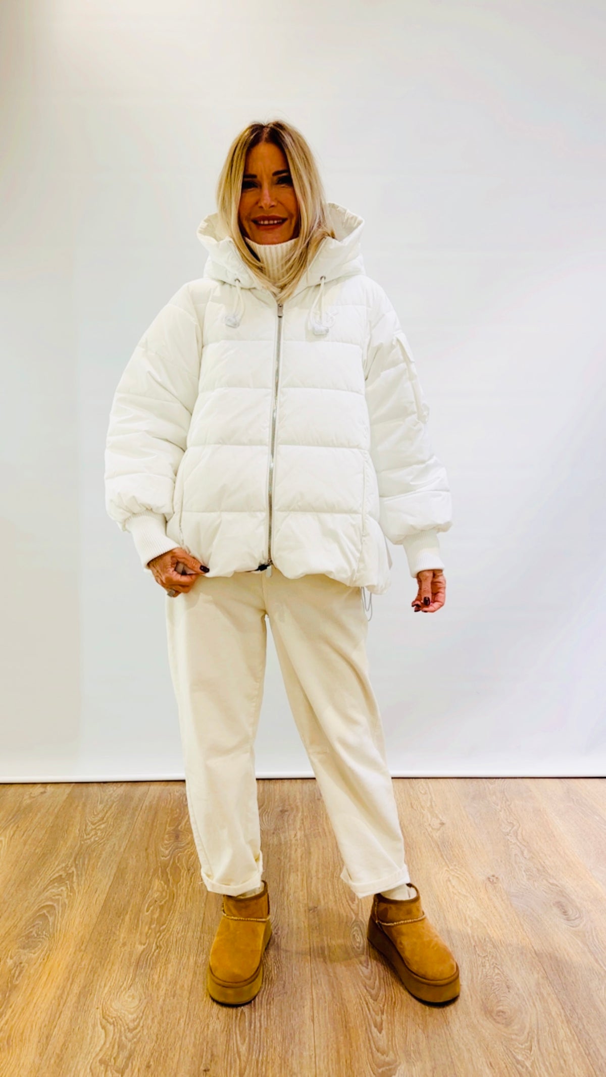 Piumino ad A con cappuccio