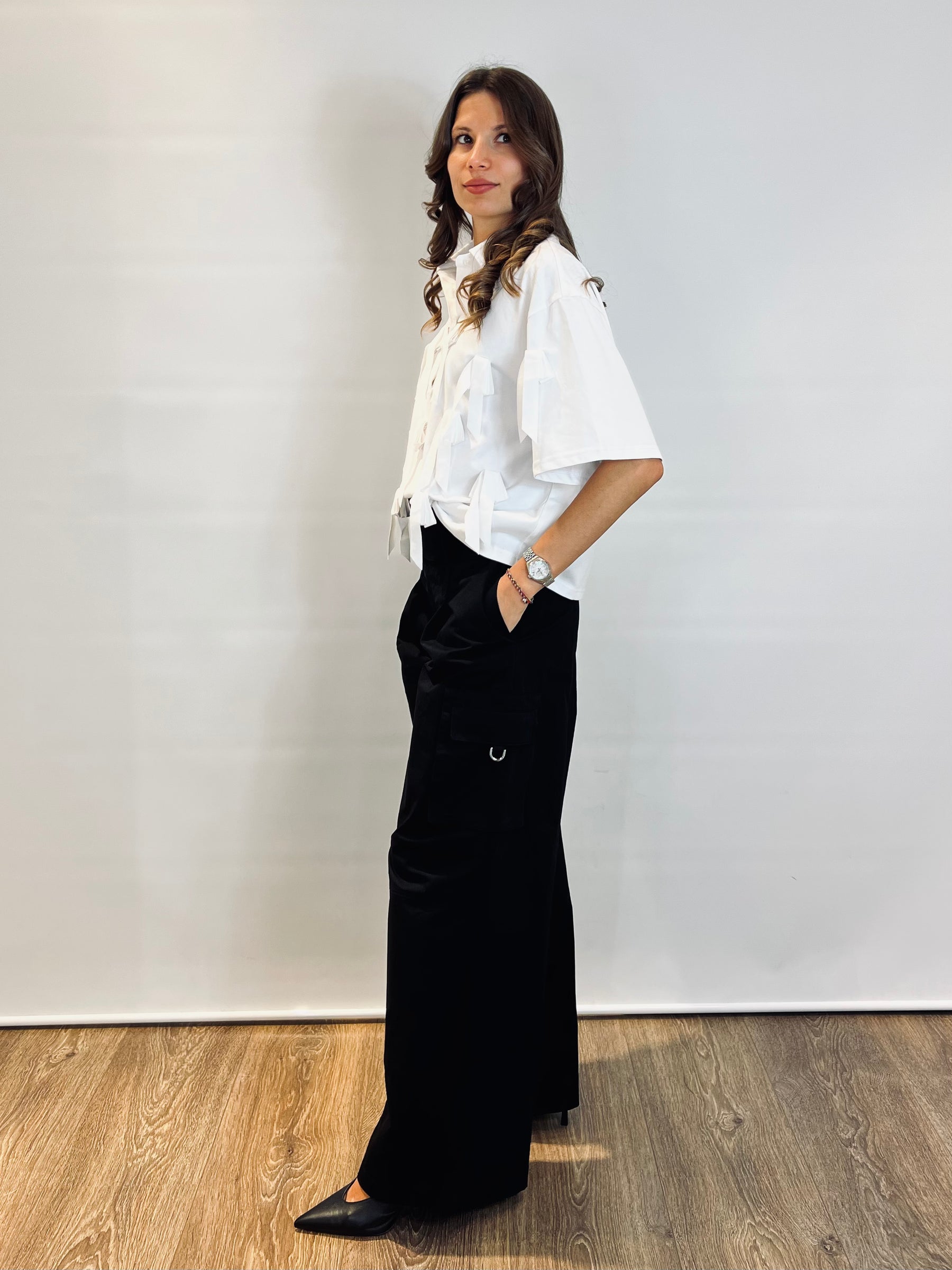 Polo con applicazioni fiocchi