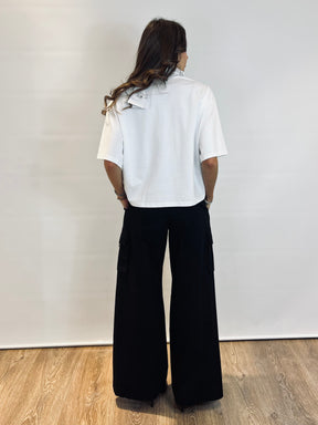 Polo con applicazioni fiocchi