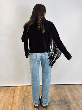 Chiodo in suede con frange