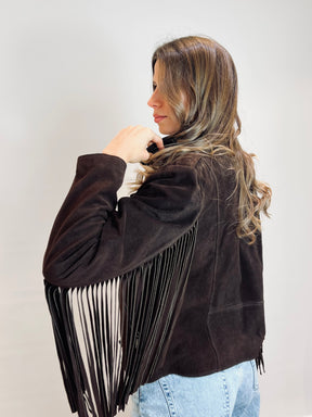 Chiodo in suede con frange