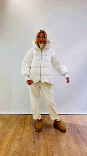 Piumino ad A con cappuccio